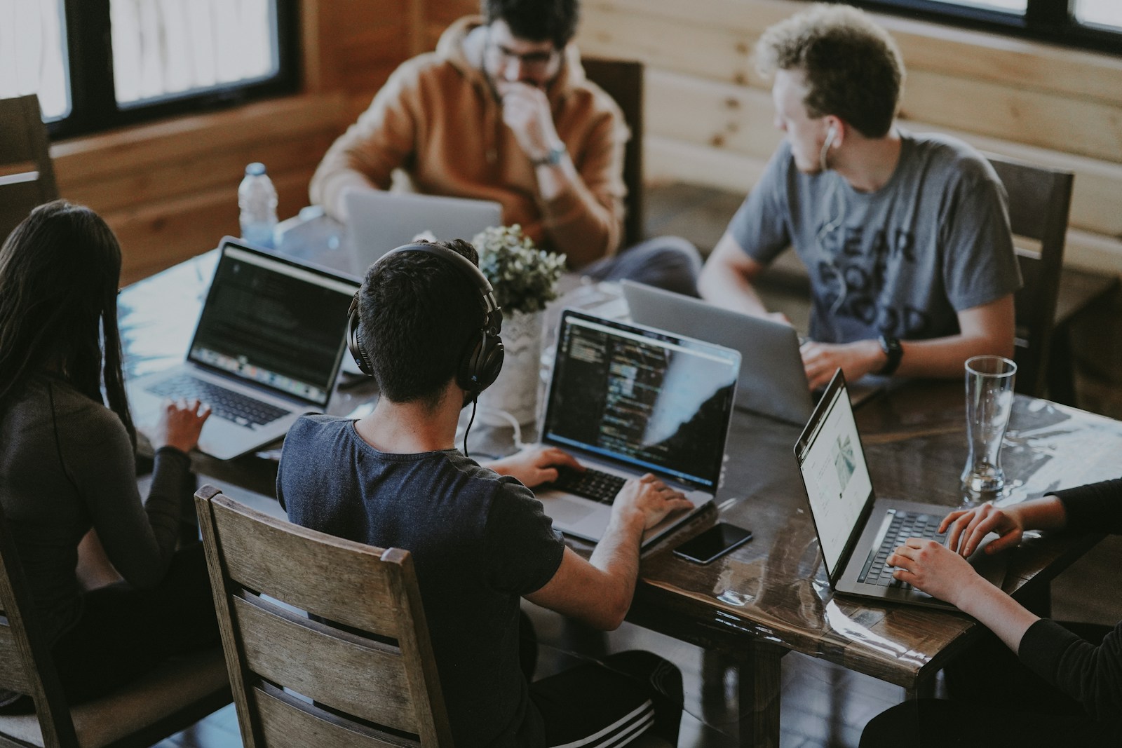 Enterprise learning team collaborating with EduNeuralAI platform dashboards
